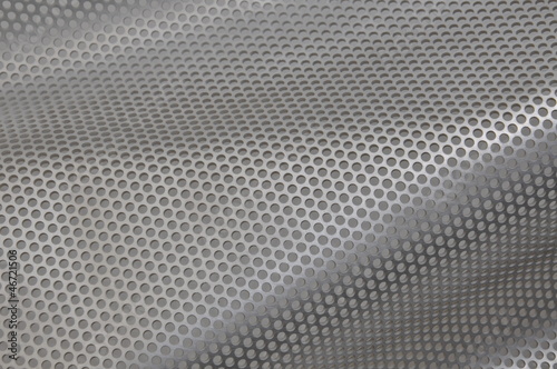 Metal sheet surface with holes