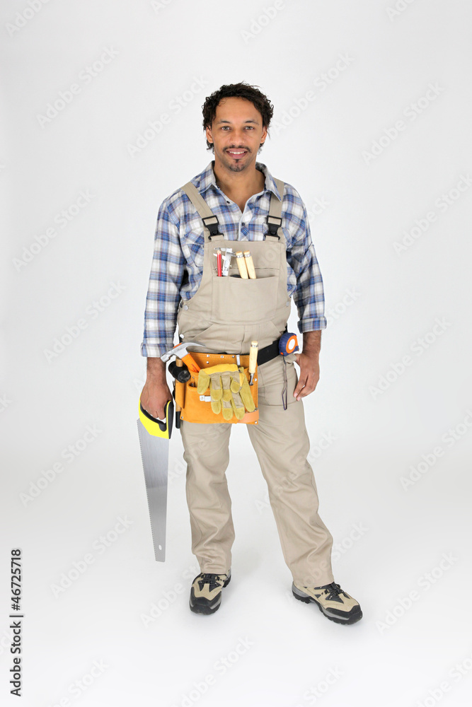 Full length carpenter with a saw Full length carpenter with a saw