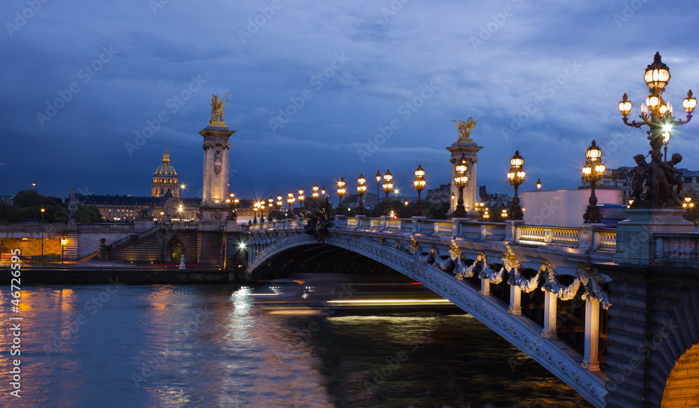 Alexander the Third bridge and Seine with golden Invalides dome Alexander the Third bridge and Seine with golden Invalides dome