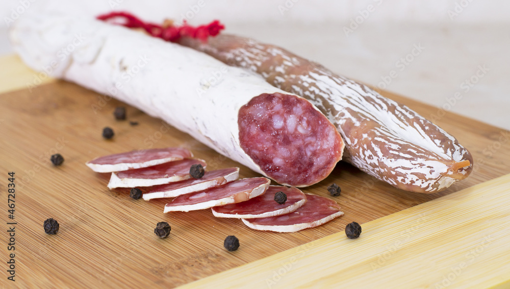 Culinary traditional spanish sausages on wooden background. Culinary traditional spanish sausages on wooden background.