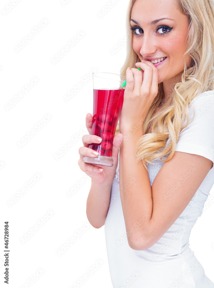 Young woman drinking lemonade, studio-shot Young woman drinking lemonade, studio-shot