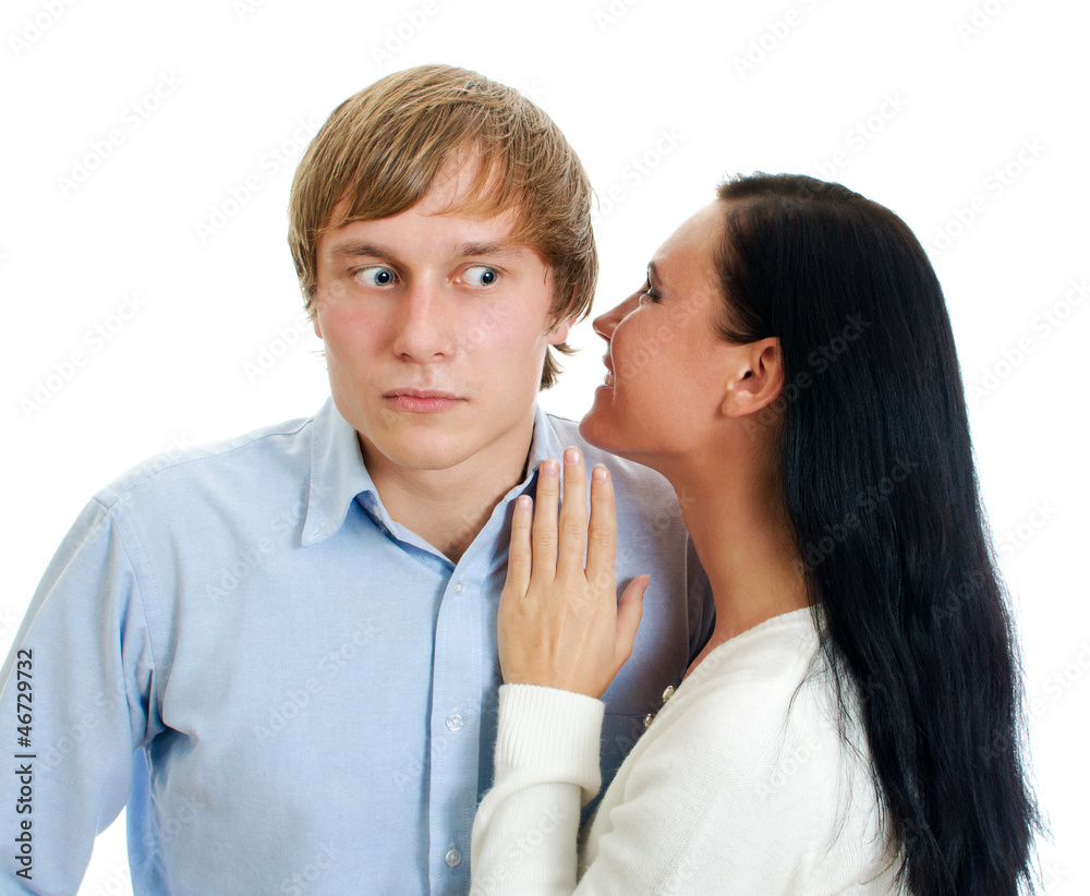 Woman whispering to a man. Isolated on white. Woman whispering to a man. Isolated on white.
