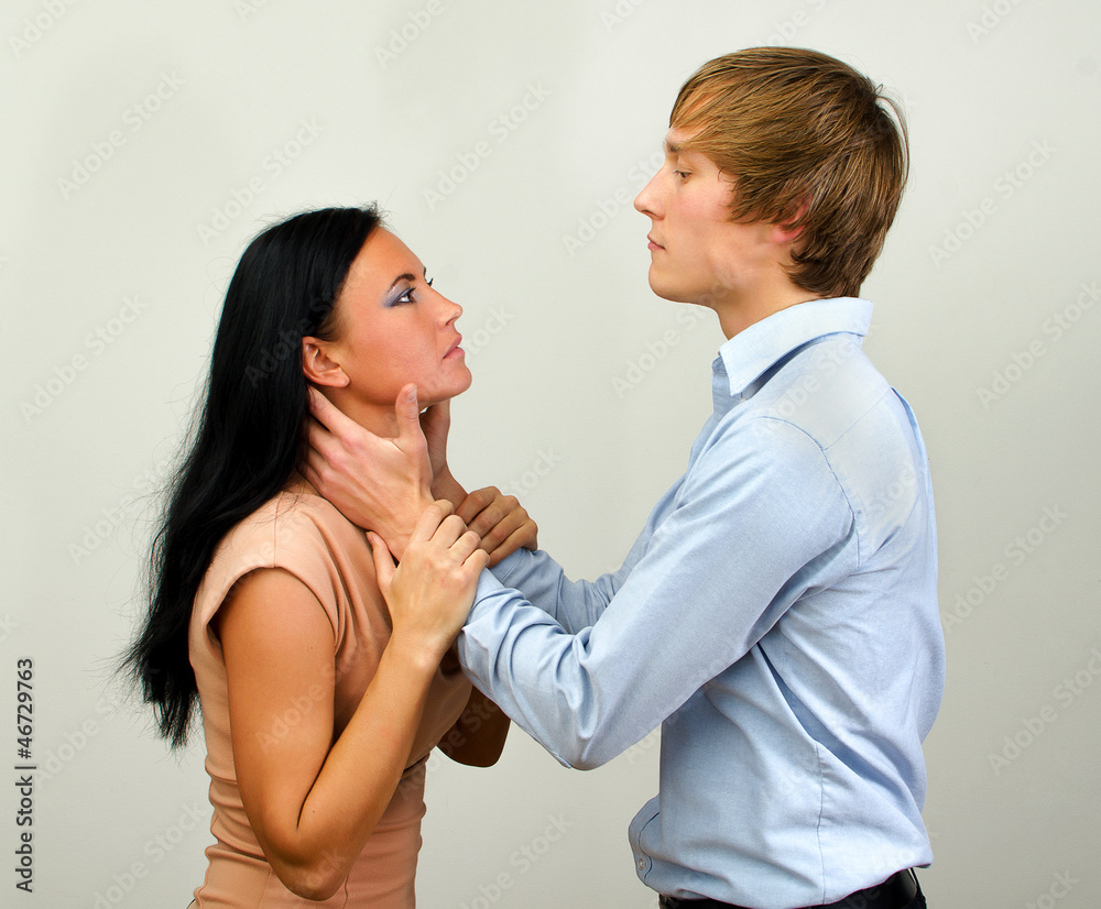 Man slapping a woman depicting domestic violence Man slapping a woman depicting domestic violence