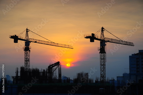 Crane construction at sunrise