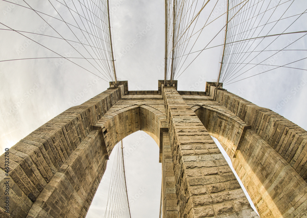 Naklejka premium Magnificient structure of Brooklyn Bridge - New York City