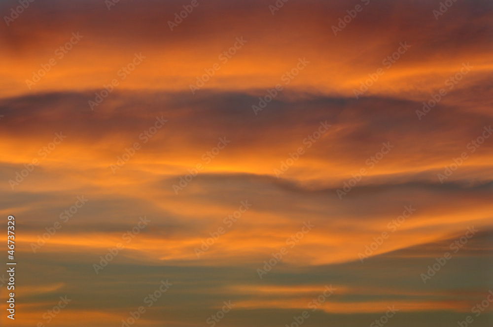Orange cloudy sky during a sunset in Brittany