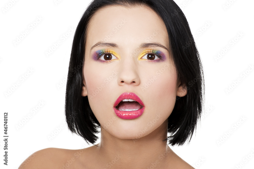 Beautiful woman with rainbow eye make up Beautiful woman with rainbow eye make up