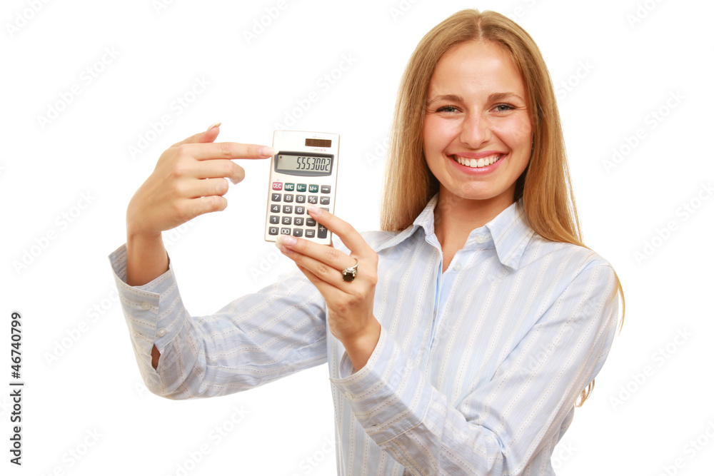 Young woman with great smile pointing at calculator Young woman with great smile pointing at calculator