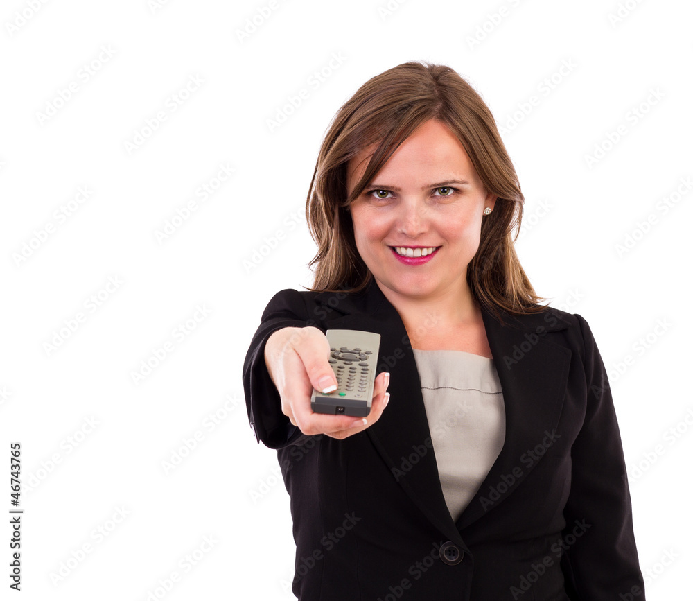 Young business woman using tv remote control Young business woman using tv remote control