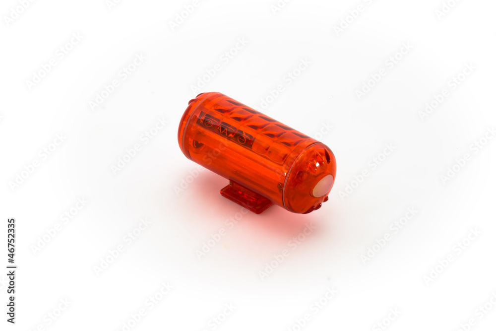 Bicycle rear red blinking light isolated on white background