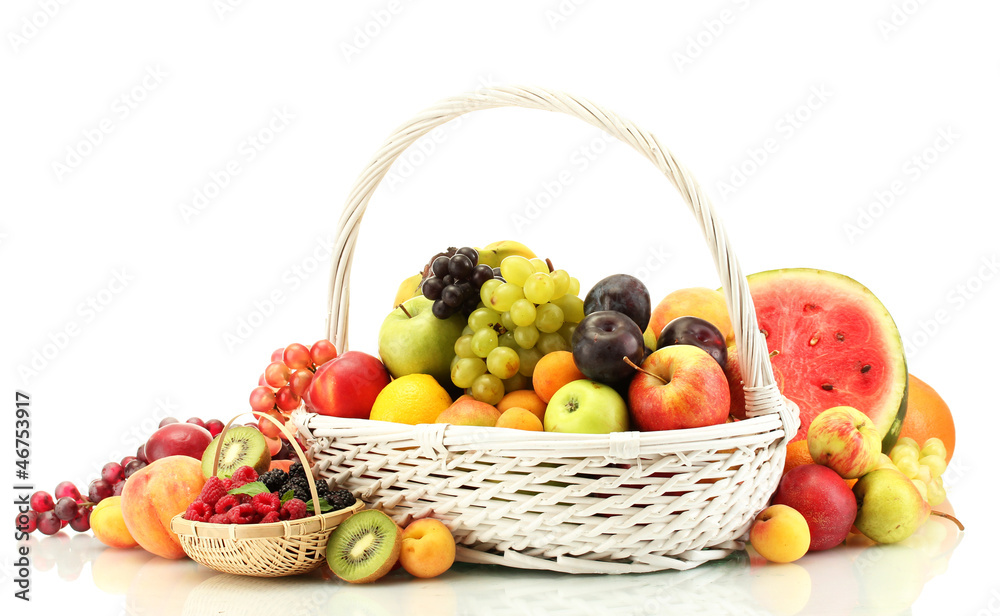 Assortment of exotic fruits and berries in baskets isolated Assortment of exotic fruits and berries in baskets isolated