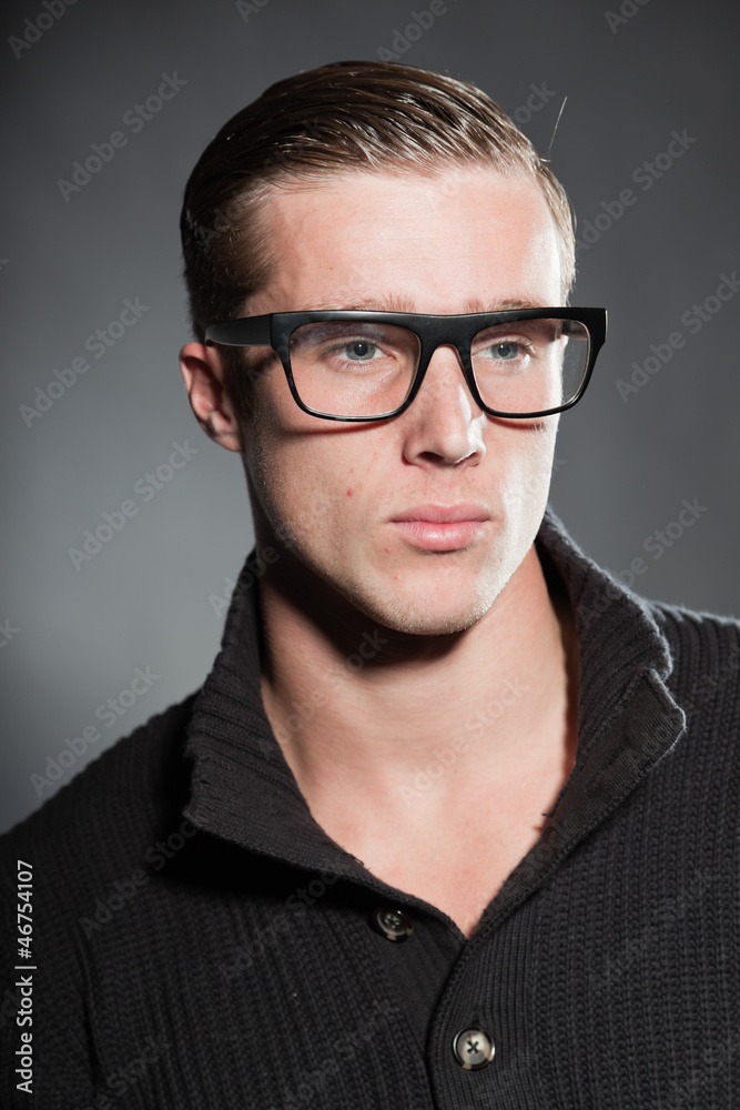 Fashion beauty portrait of young man with retro glasses.
