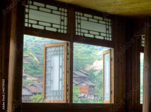 Chinese village through the opens window. Chinese interior