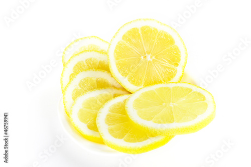 Fresh lemon fruit slices on white background