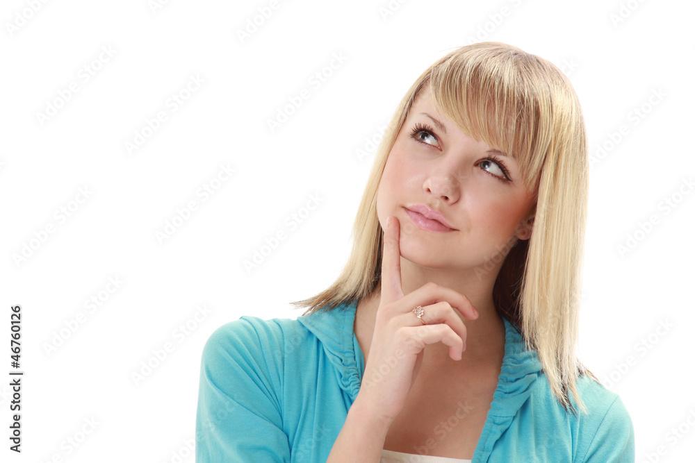 Pensive young woman looking at copyspace Pensive young woman looking at copyspace
