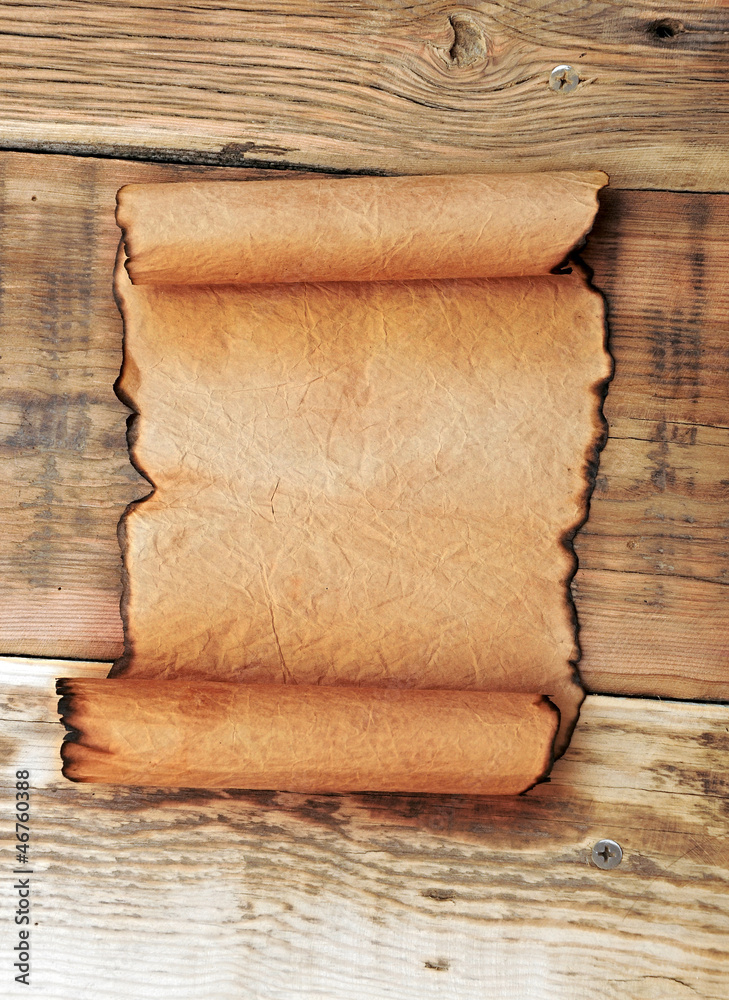 Paper scroll on wooden panel Paper scroll on wooden panel