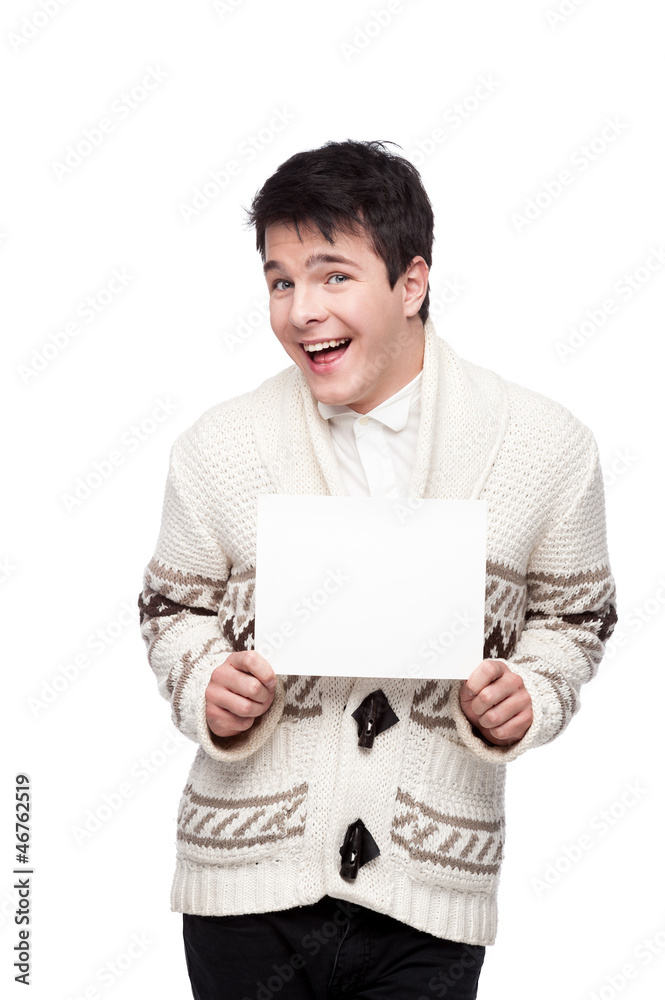 smiling casual winter man holding sign smiling casual winter man holding sign