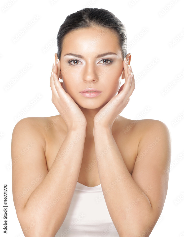 A young woman touching her face, closeup A young woman touching her face, closeup