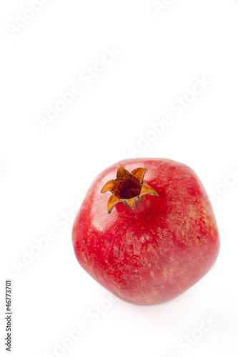 Pomegranate on white background