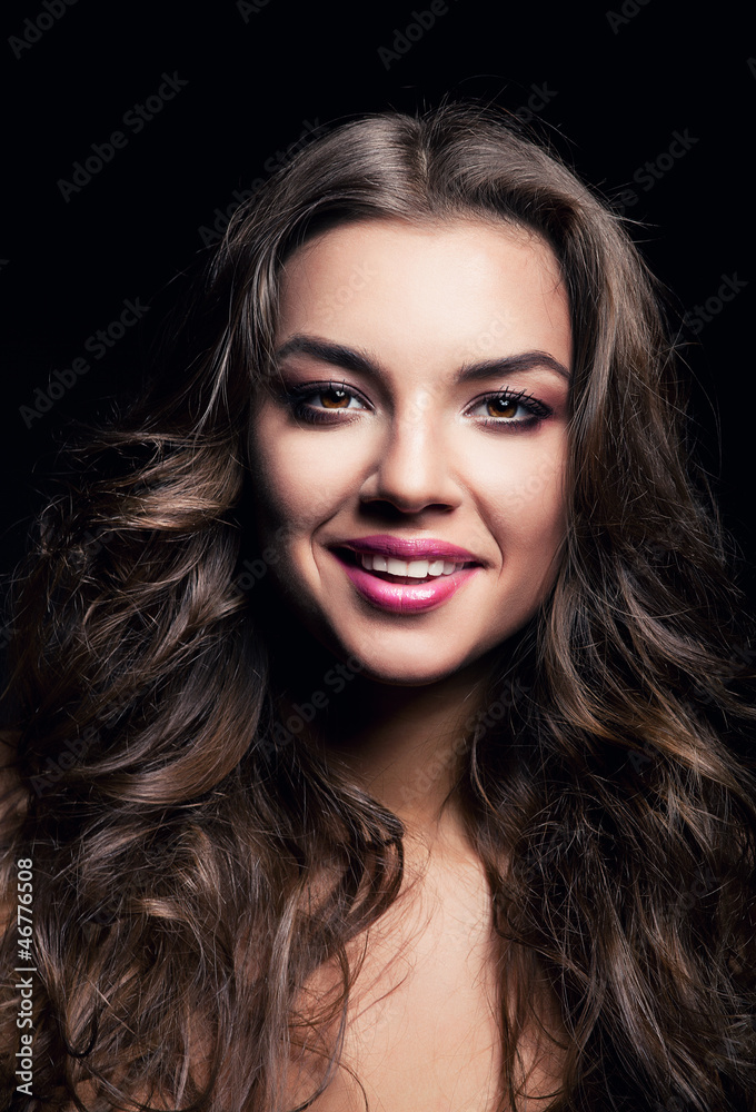 Fototapeta premium happy girl with long curly hair