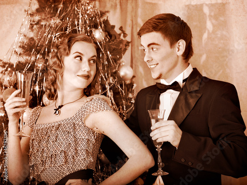 Couple on Christmas party.  Black and white retro. photo