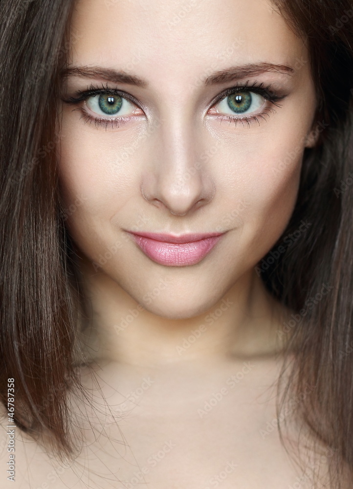 Closeup woman face with beautiful makeup looking sexy. Portrait Closeup woman face with beautiful makeup looking sexy. Portrait
