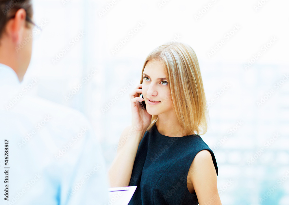 Two young business collegues. Two young business collegues.