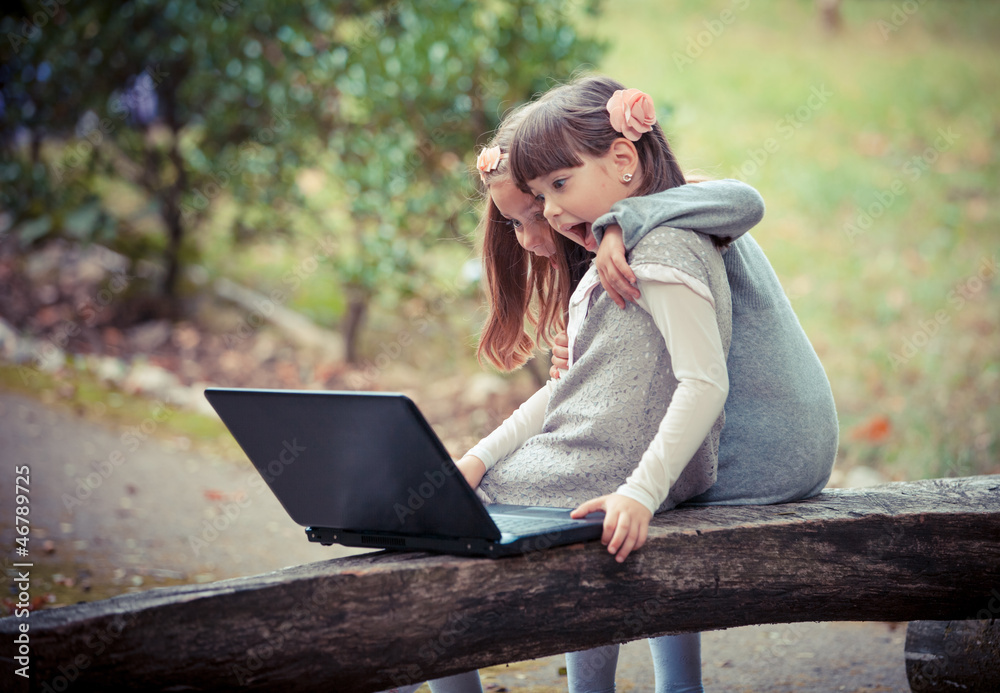 girlfriend in autumn park with laptop girlfriend in autumn park with laptop