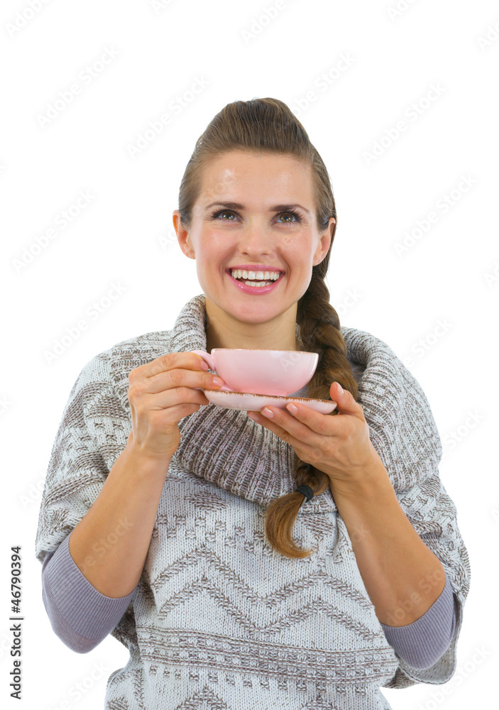 Happy woman in sweater having hot beverage Happy woman in sweater having hot beverage