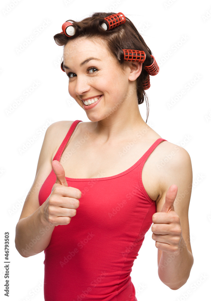 Woman is showing thumb up gesture Woman is showing thumb up gesture