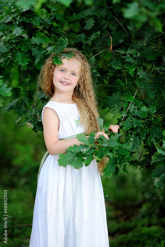 portrait of little girl outdoors in summer portrait of little girl outdoors in summer