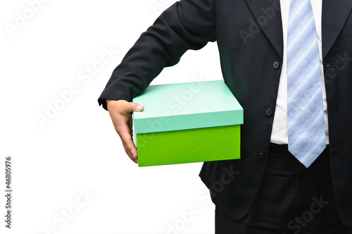 Businessman holding a gift box