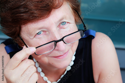 Photos Portrait of 65-years-old beautiful woman outdoors