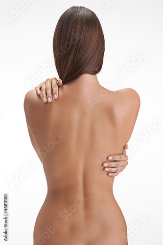 Back side view of a young,  woman's perfect body