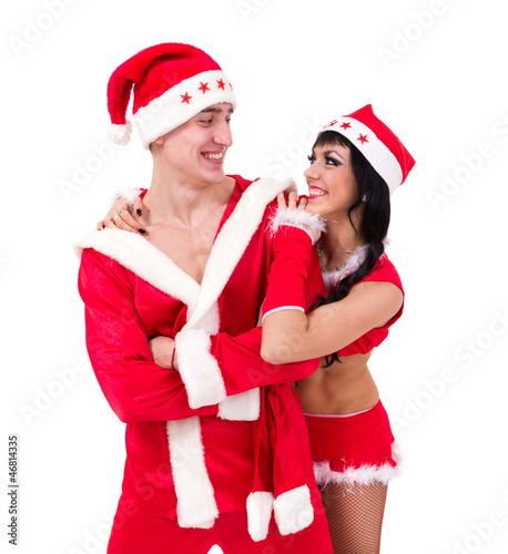 couple wearing santa claus clothes