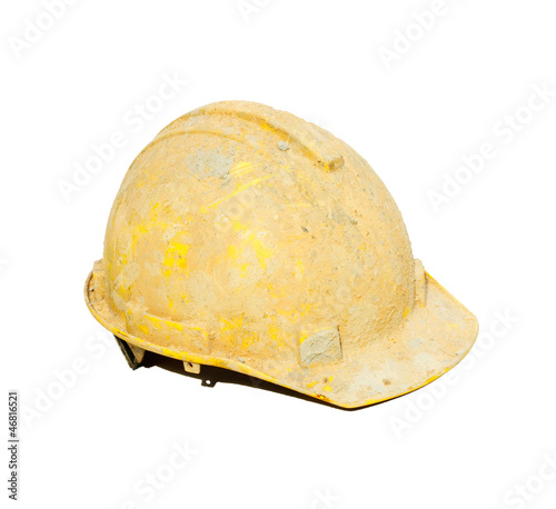 Dirty yellow hard hat on white background.
