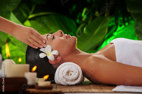 portrait of young beautiful woman in spa environment.