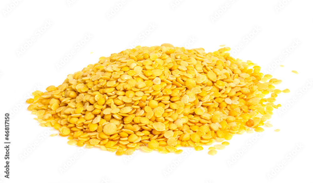 Yellow lentils isolated on white background. Macro shot Yellow lentils isolated on white background. Macro shot