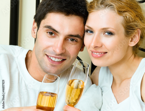 Cheerful couple with champagne