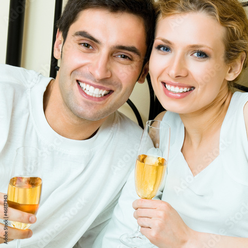 Cheerful couple with champagne