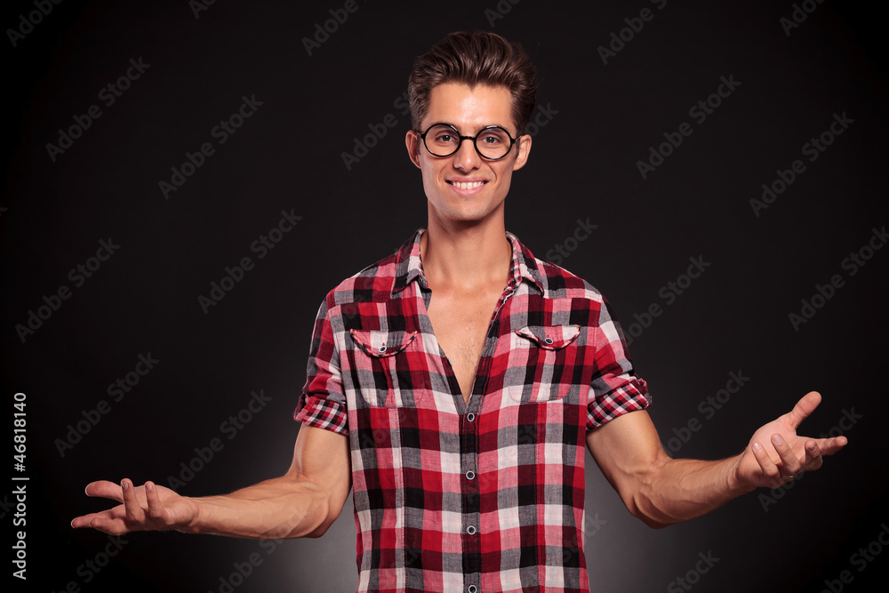 Fototapeta premium fashion man wearing glasses welcoming