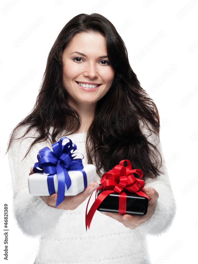 Young woman hands over two gifts - isolated Young woman hands over two gifts - isolated