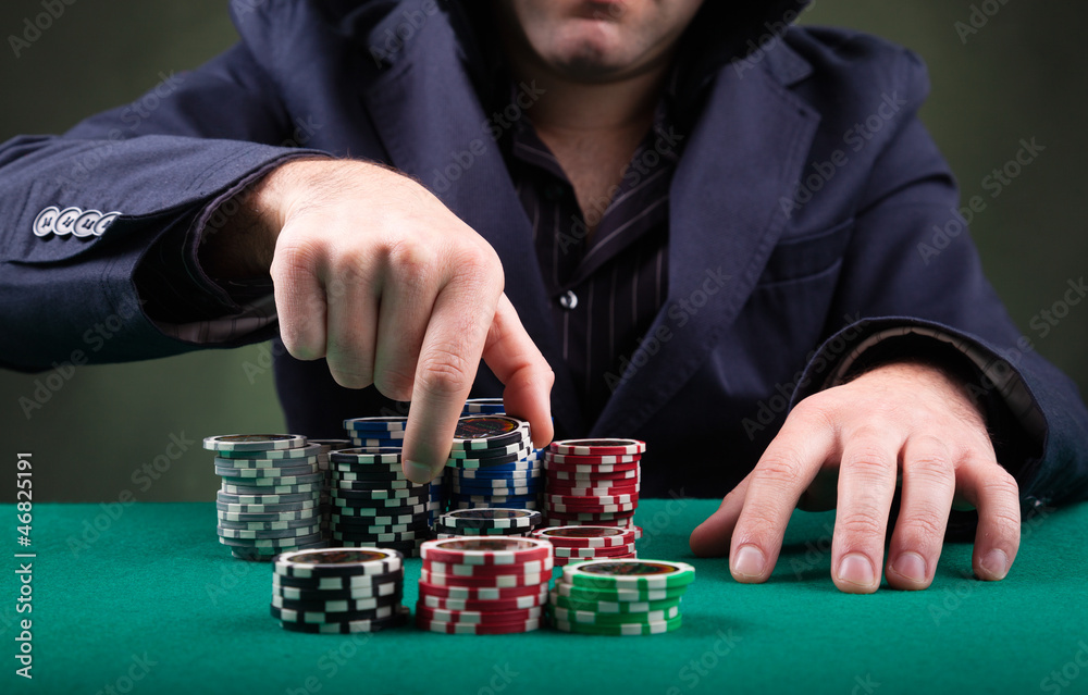 Poker player on black background Poker player on black background