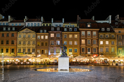Mermaid on warsaw old town at night