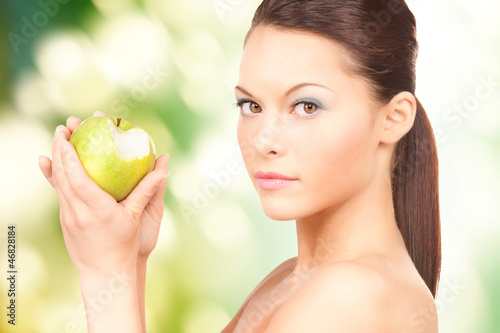 young beautiful woman with green apple