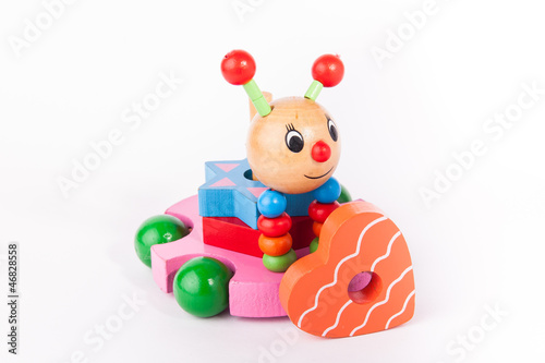 Early child development wooden toys isolated on white