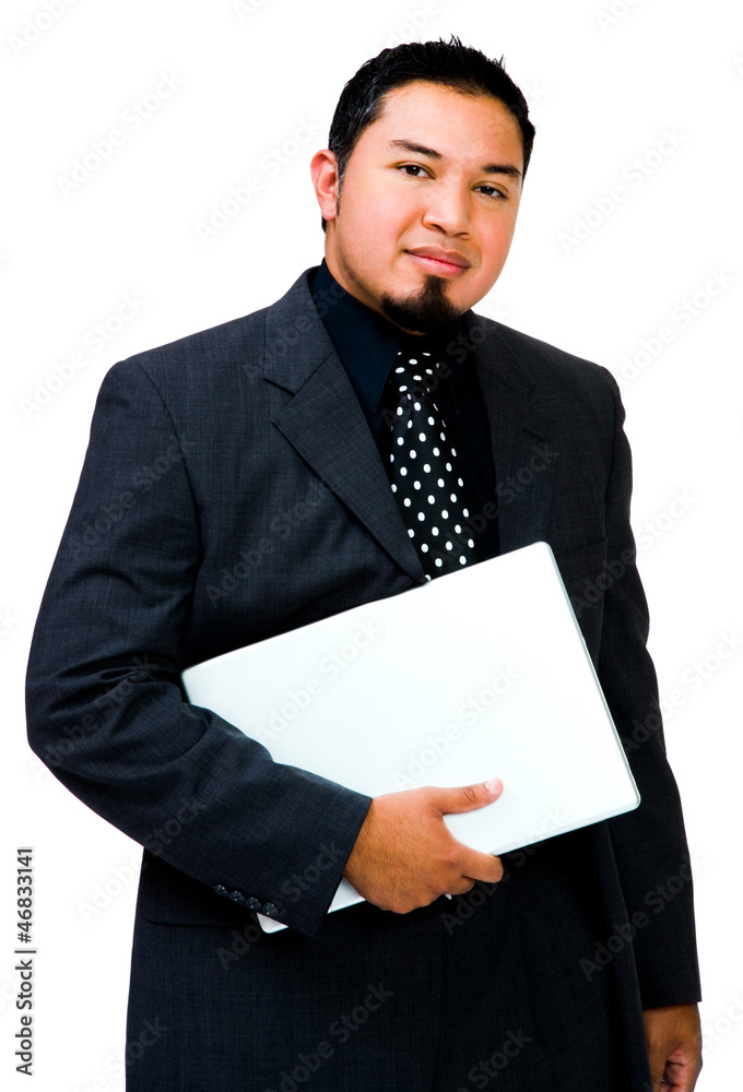 Latin American businessman holding laptop Latin American businessman holding laptop