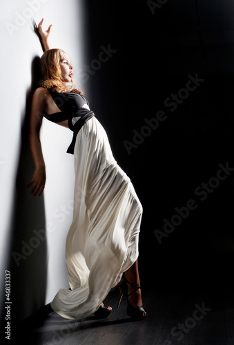 Woman at the wall