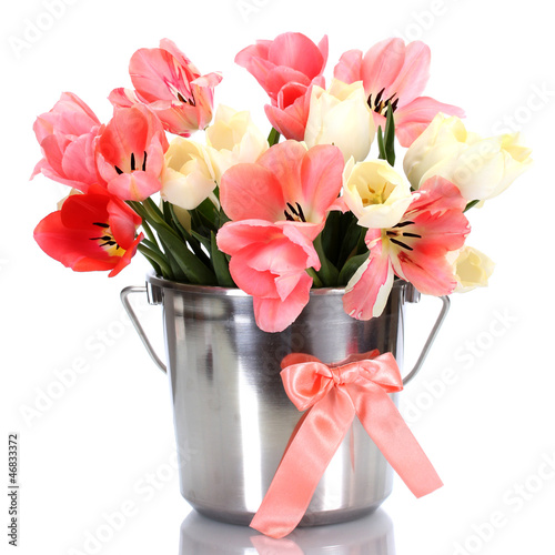 Fototapeta Naklejka Na Ścianę i Meble -  beautiful pink tulips in bucket isolated on white.