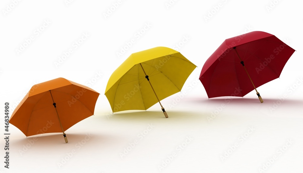 three multicoloured umbrellas on a white